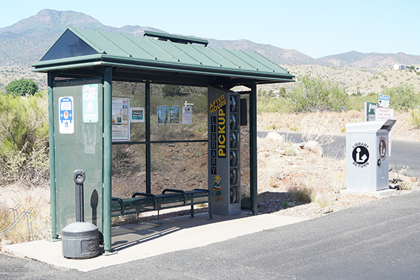 lockers underneath a bus stop
