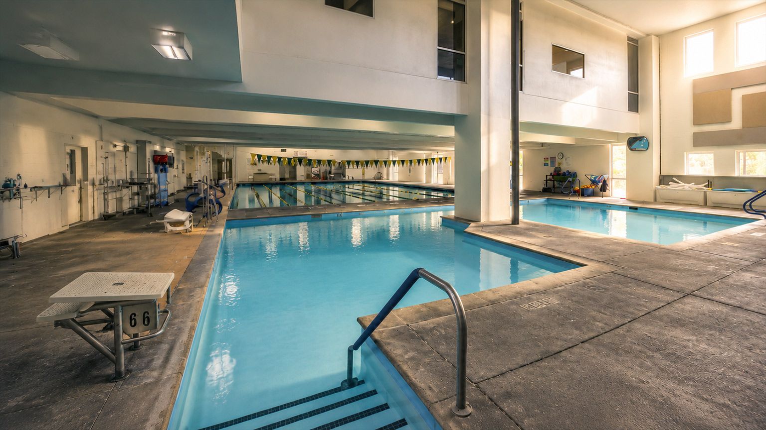 Indoor swimming pools at Yavapai College Prescott Campus with lap lanes and therapy pools.