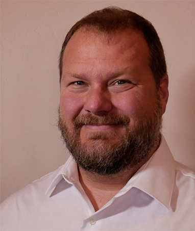 photo of smiling John Willoughby